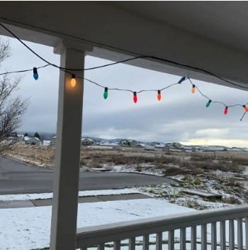 Snowy landscape with colorful lights