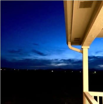 Twilight sky with distant lights