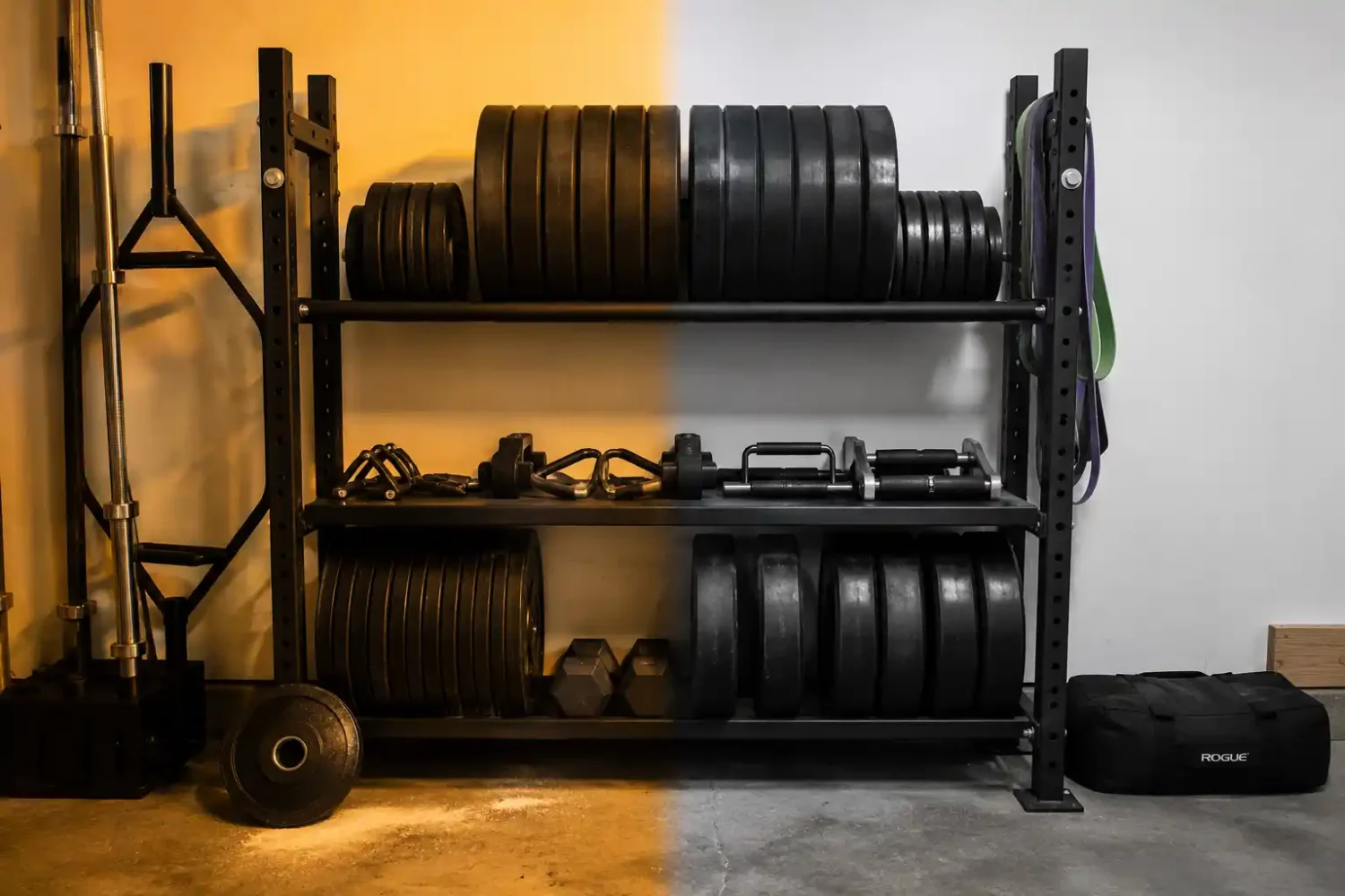 Weight storage rack split by lighting, warm yellow tone on one side and clean white light on the other.
